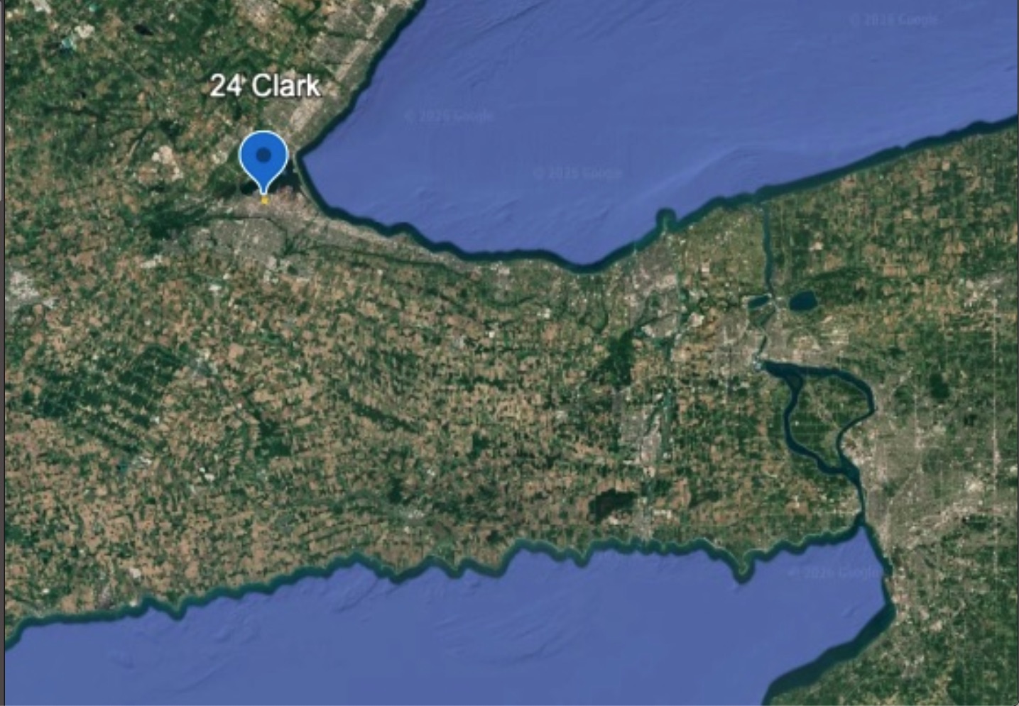 Satellite view of the Niagara Peninsula between Lake Ontario and Lake Erie, with a pin at 24 Clark in Hamilton